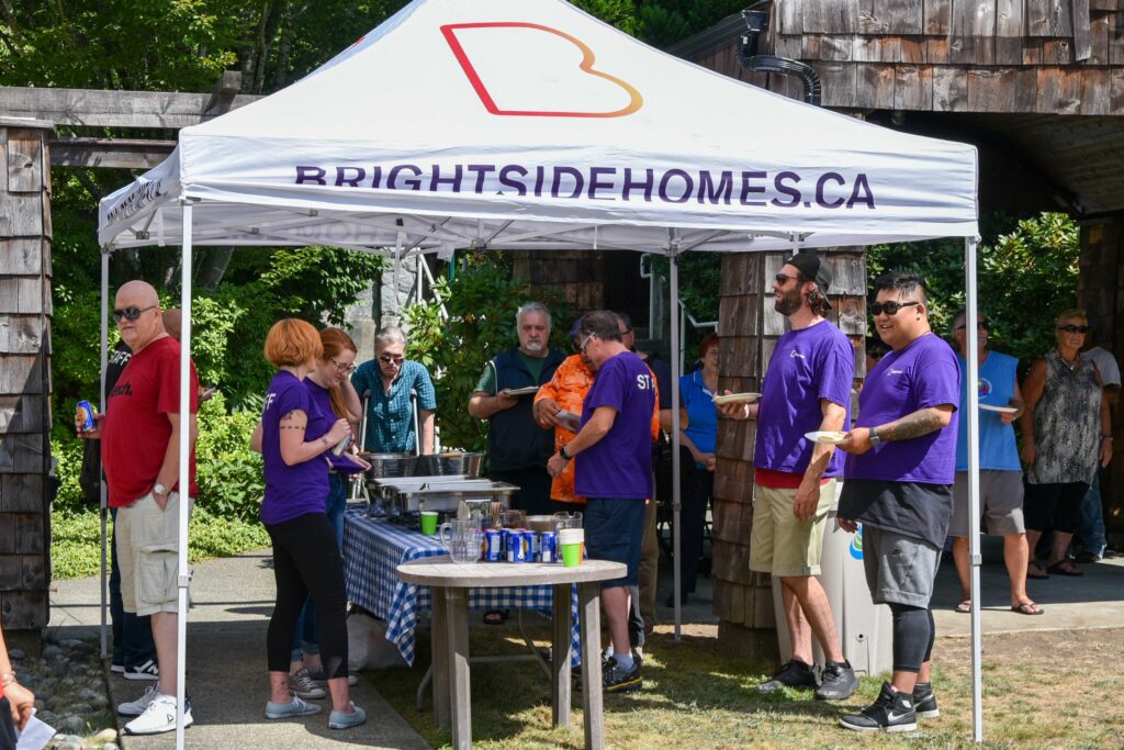 Photo of a group of people outside during Brightside 2019 summer BBQ at Lions View