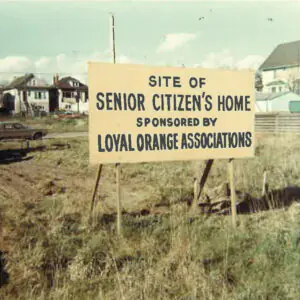 Site of Loyal Orange with a sign with message "Site of Senior Citizen's Home sponsored by Loyal Orange Associations"
