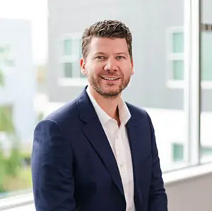 Headshot photo of Board member Darren Sauer
