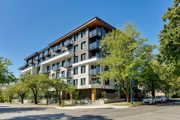 Exterior of The Hawthorn residential building with trees in front of it